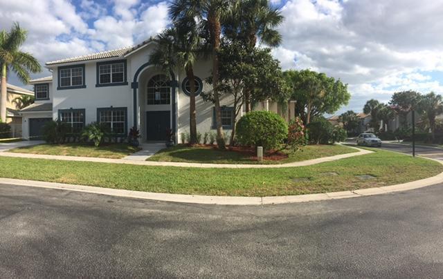 10720 Bexley Boulevard Boca Raton, FL 33428 - Photo 29 of 29 a view of a house with a yard