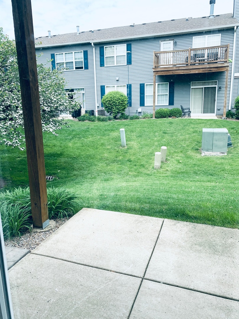 2480 Golf Ridge Circle Naperville, IL 60563 - Photo 18 of 18 a view of a house with garden