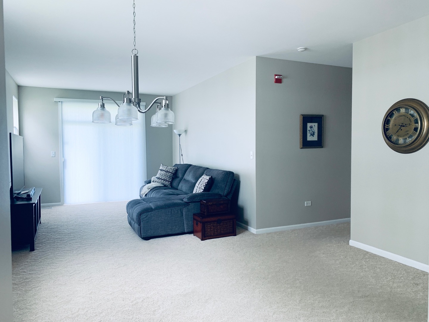 2480 Golf Ridge Circle Naperville, IL 60563 - Photo 3 of 18 a living room with furniture and a chandelier
