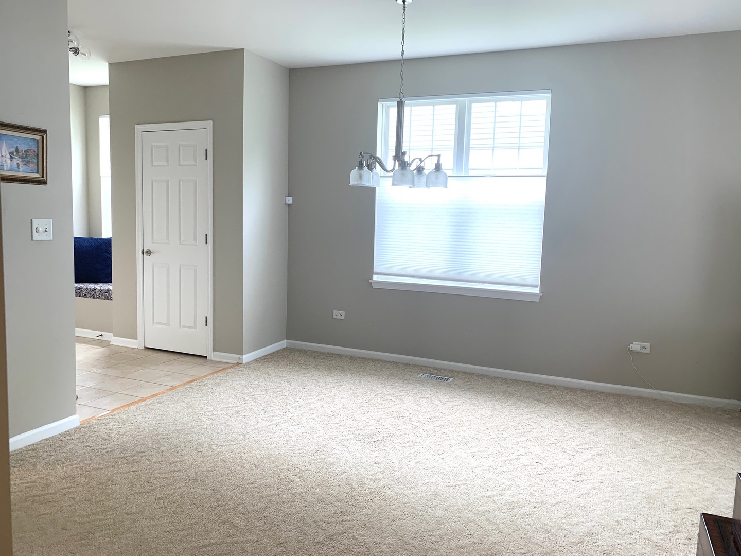 2480 Golf Ridge Circle Naperville, IL 60563 - Photo 5 of 18 a view of an empty room with a window