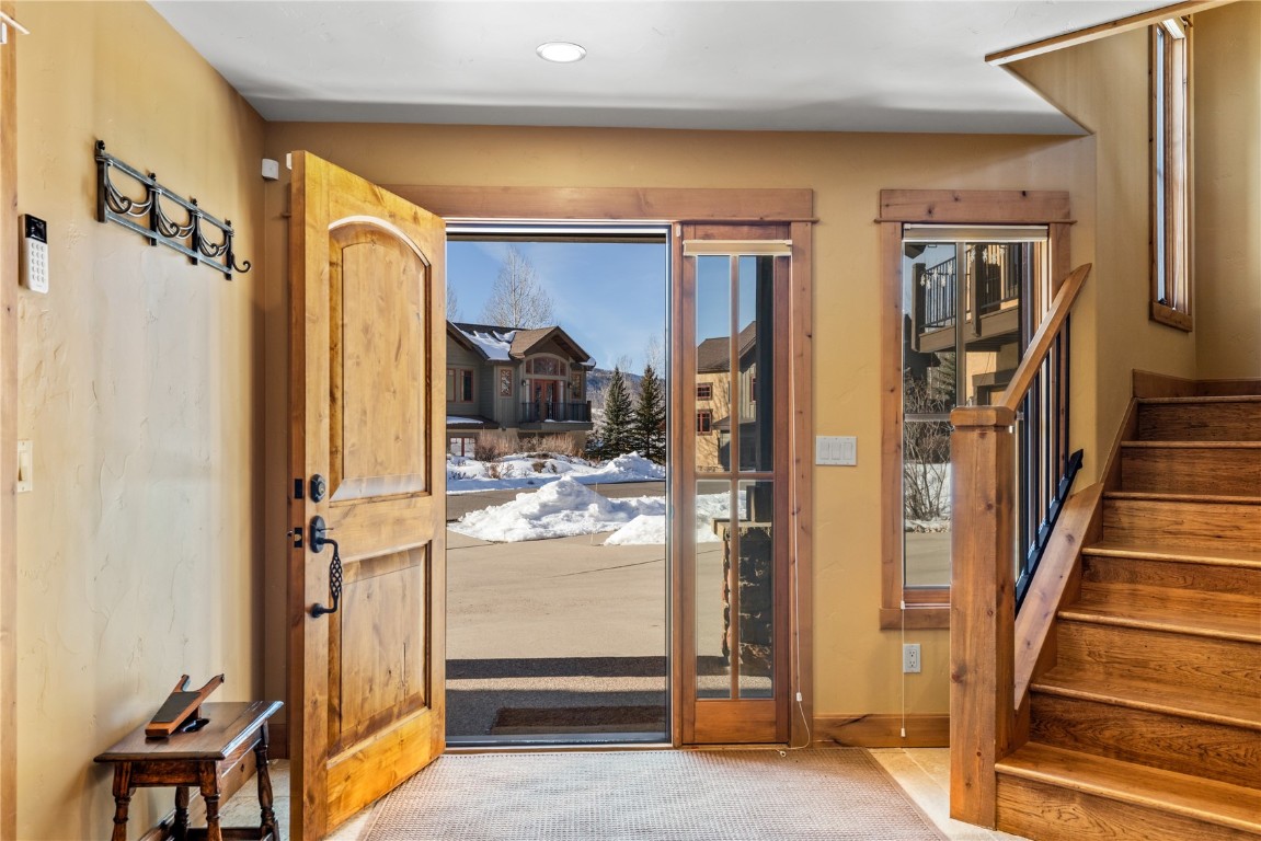 3258 Snowflake Circle, Unit 2 Steamboat Springs, CO 80487 - Photo 33 of 45 a view of hallway with livingroom and furniture