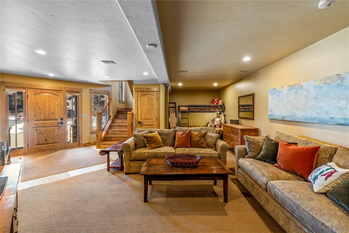 3258 Snowflake Circle, Unit 2 Steamboat Springs, CO 80487 - Photo 35 of 45 a living room with furniture and a large window