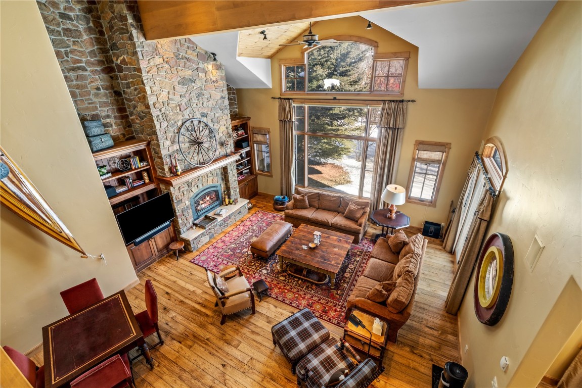 3258 Snowflake Circle, Unit 2 Steamboat Springs, CO 80487 - Photo 4 of 45 a living room with furniture a rug and a window