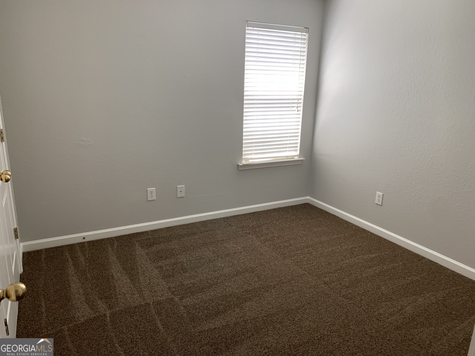 165 Lakeside Point Covington, GA 30016 - Photo 14 of 26 an empty room with a window
