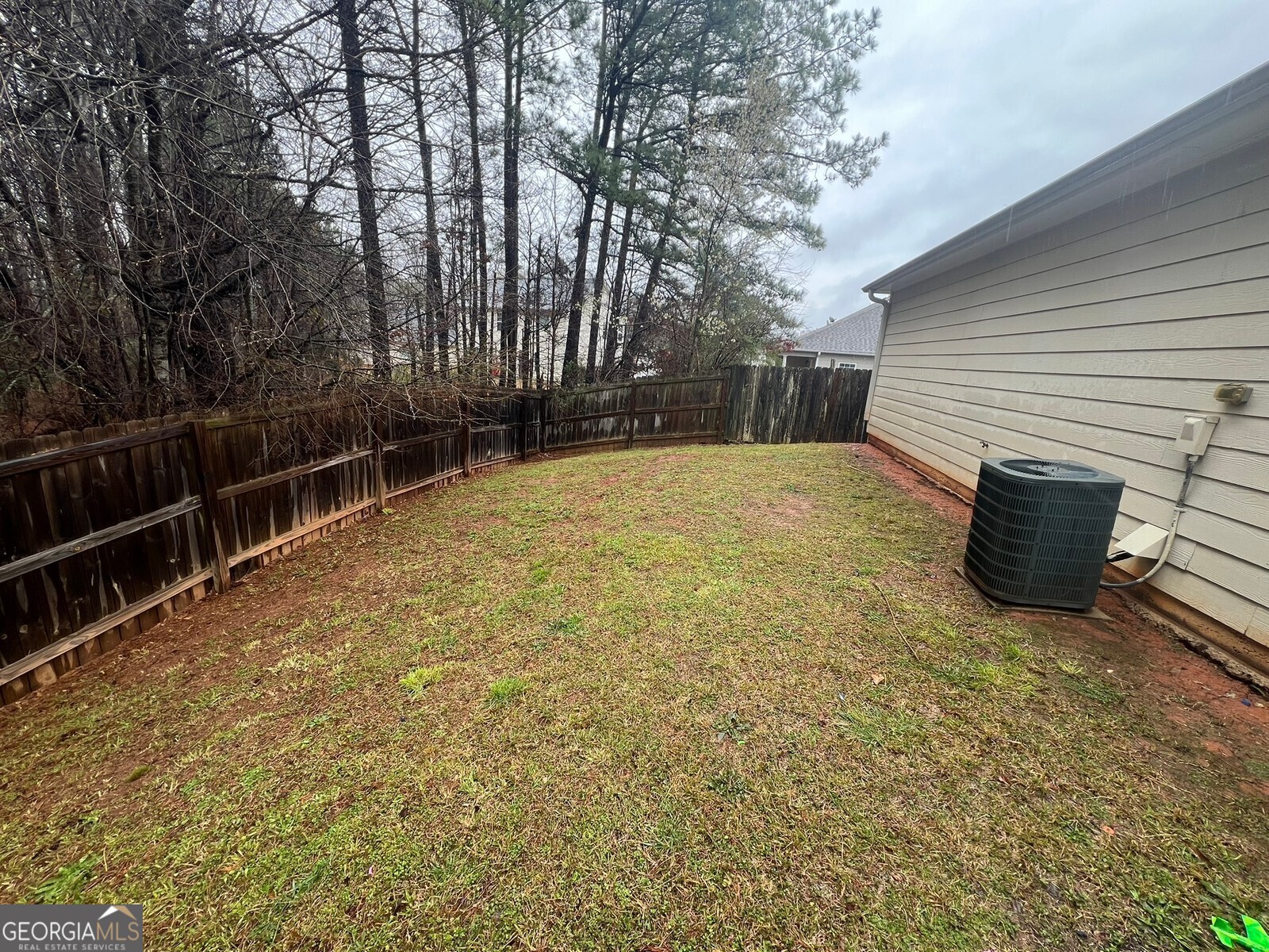 165 Lakeside Point Covington, GA 30016 - Photo 18 of 26 a backyard of a house with lots of green space