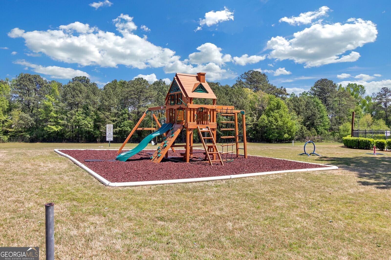 165 Lakeside Point Covington, GA 30016 - Photo 25 of 26 a view of a playground with basketball court