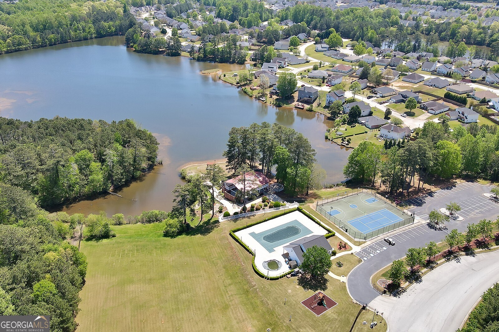 165 Lakeside Point Covington, GA 30016 - Photo 26 of 26 an aerial view of a house with a lake view