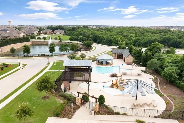a view of a swimming pool with a patio
