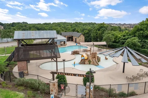 a view of a patio with couches table and chairs