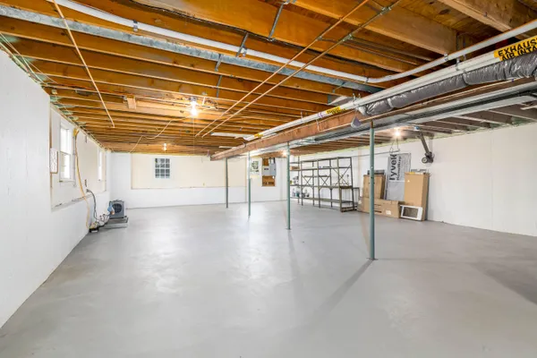 a view of a room with wooden walls