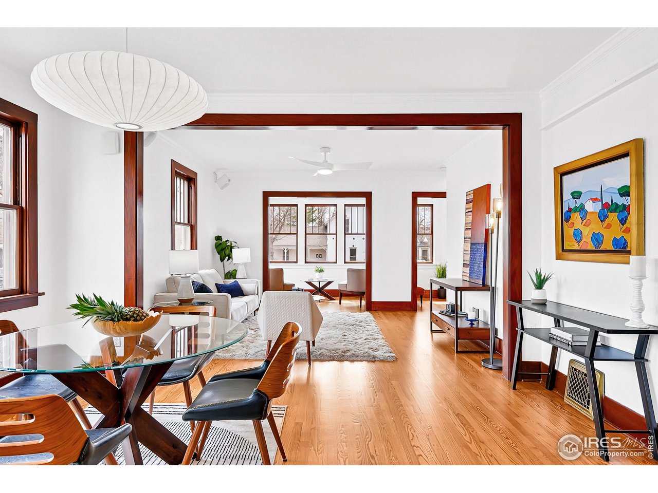 1741 Pine Street Boulder, CO 80302 - Photo 2 of 38 a dining room with furniture and wooden floor
