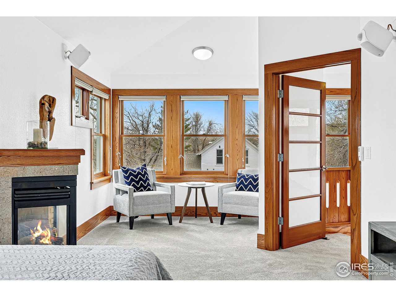 1741 Pine Street Boulder, CO 80302 - Photo 23 of 38 a living room with furniture and a fireplace