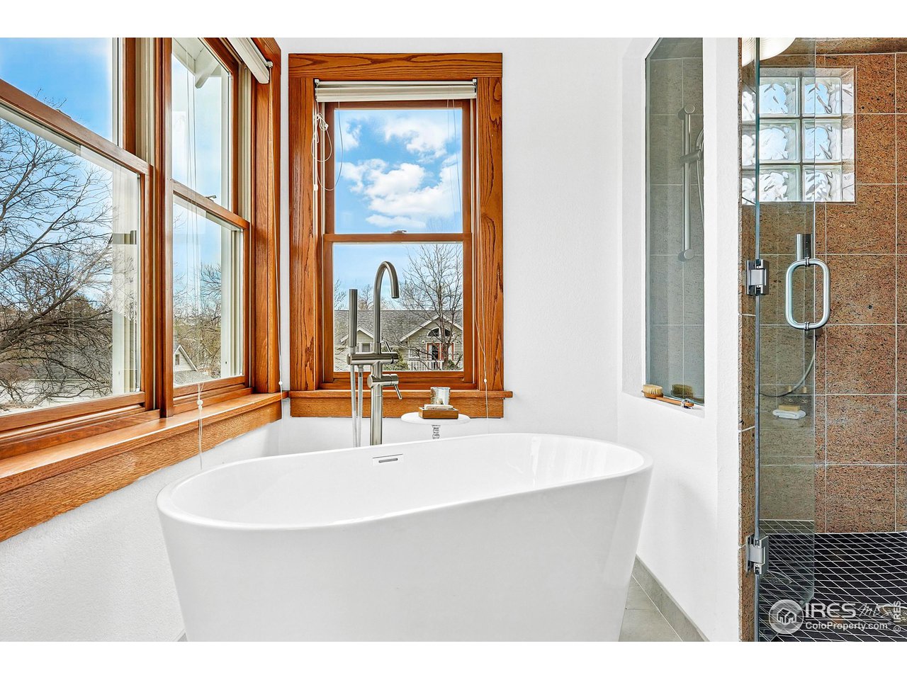 1741 Pine Street Boulder, CO 80302 - Photo 24 of 38 a bathroom with a sink and a large mirror