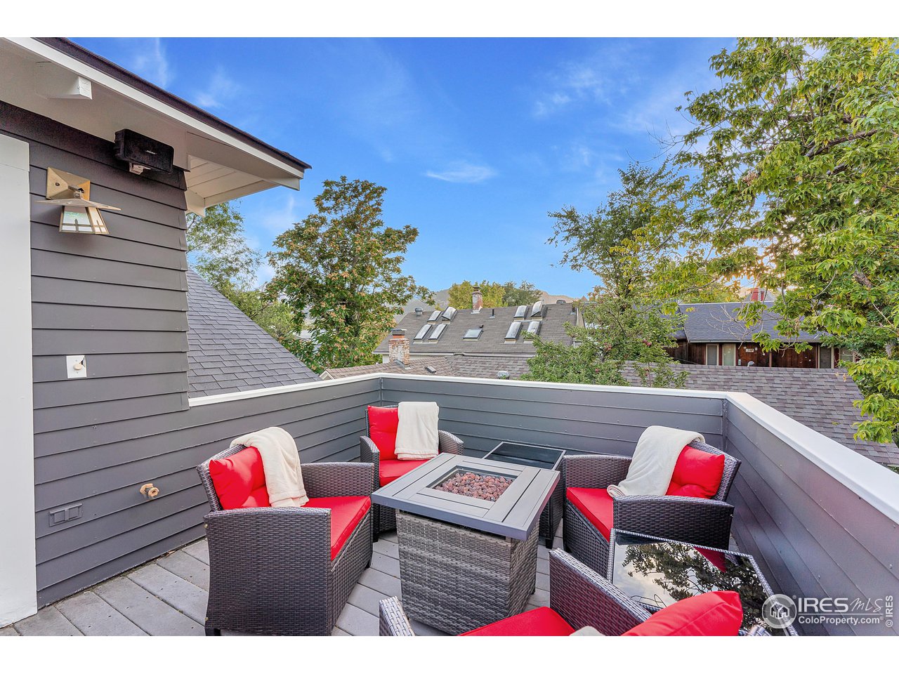 1741 Pine Street Boulder, CO 80302 - Photo 27 of 38 a wooden bench sitting in front of a building