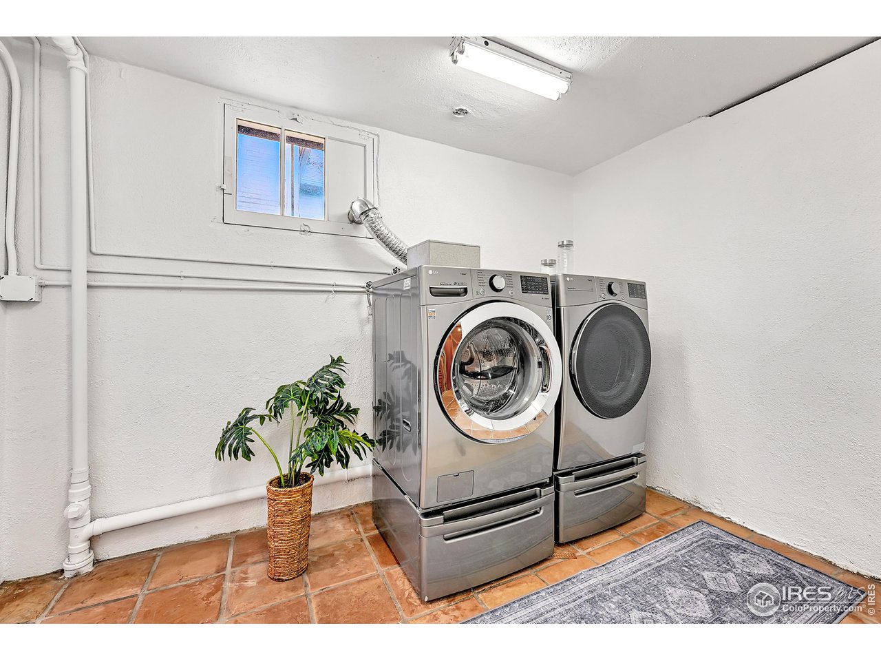 1741 Pine Street Boulder, CO 80302 - Photo 33 of 38 a utility room with dryer and washer