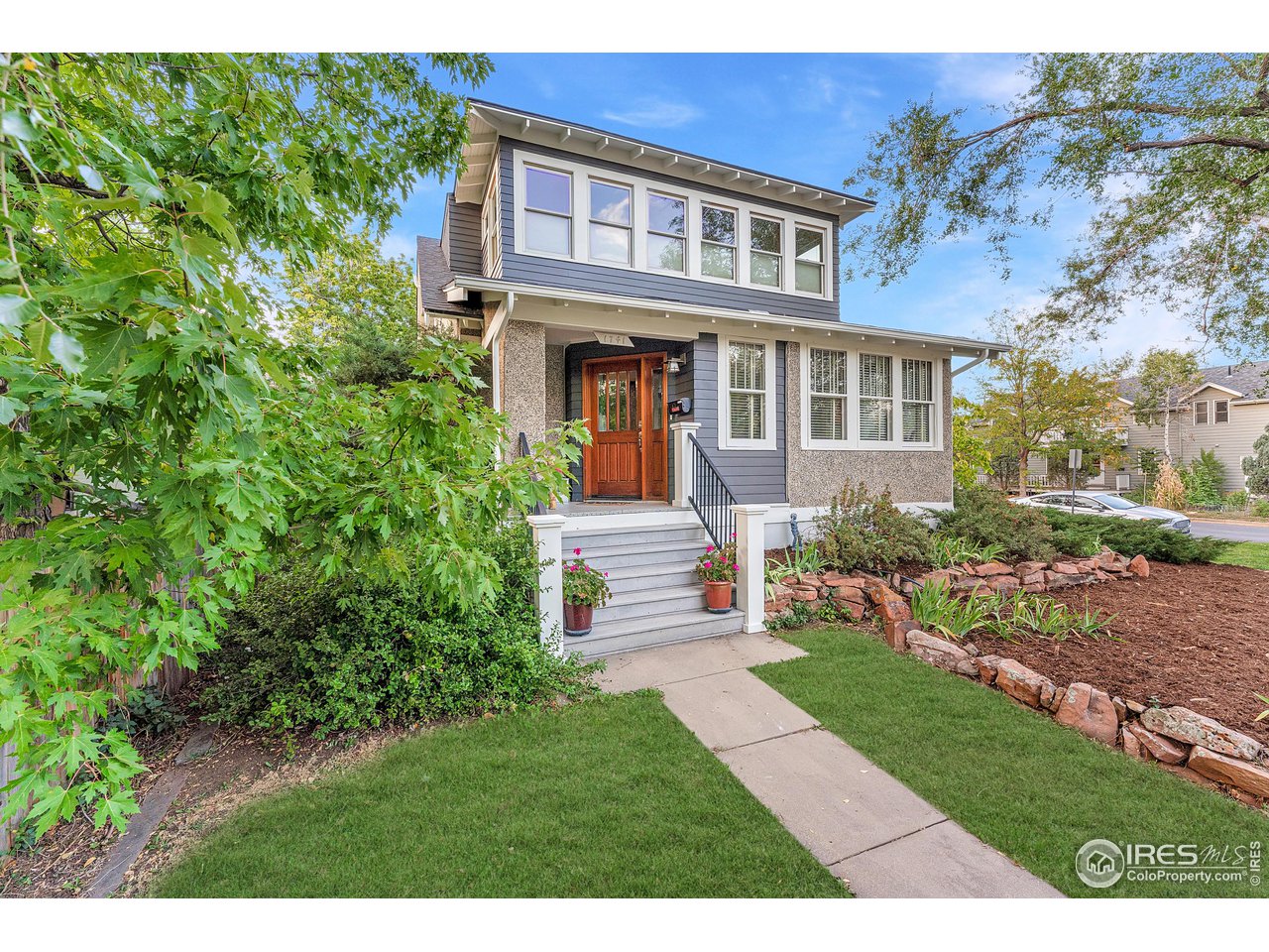 1741 Pine Street Boulder, CO 80302 - Photo 36 of 38 a front view of a house with a yard