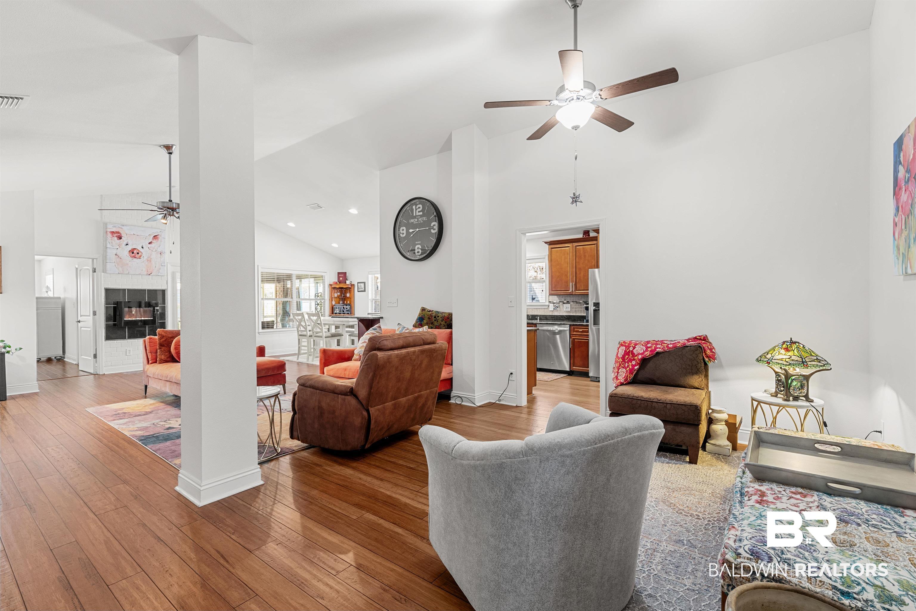 1850 Arcadia Drive Foley, AL 36535 - Photo 7 of 44 Living room with ceiling fan, high vaulted ceiling, and light wood finished floors