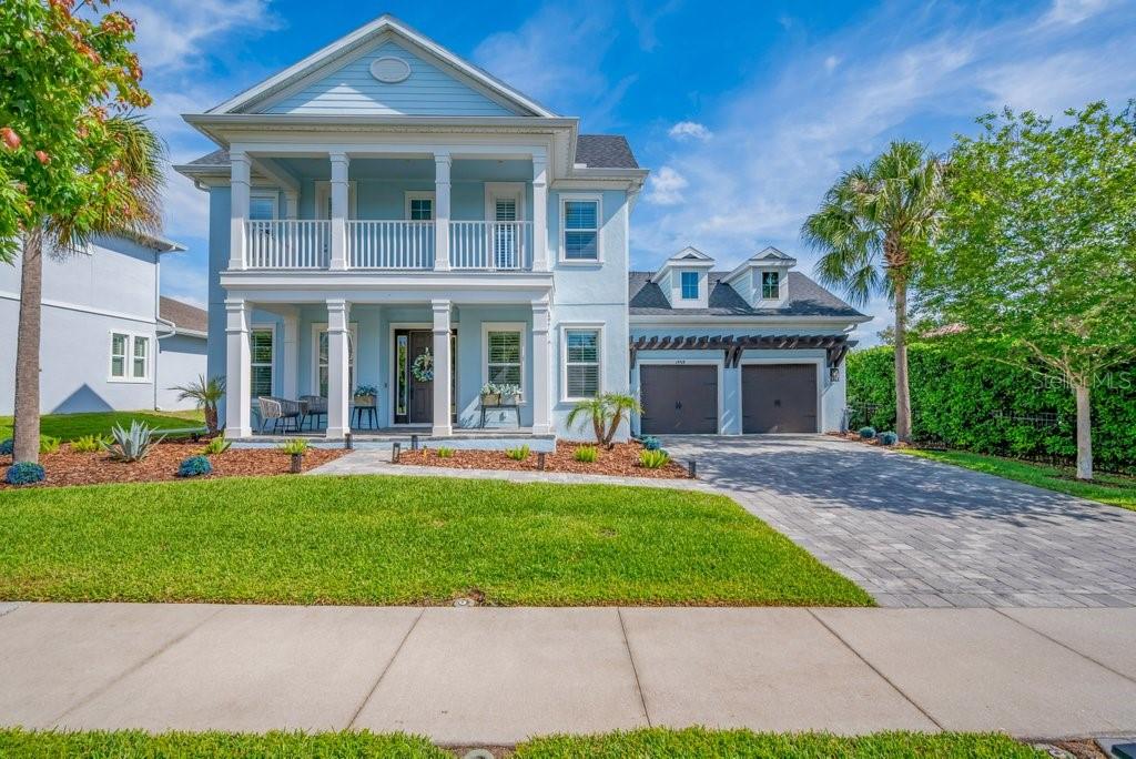 14908 Bassinger Lane Lithia, FL 33547 - Photo 3 of 56 a front view of a house with swimming garden and porch