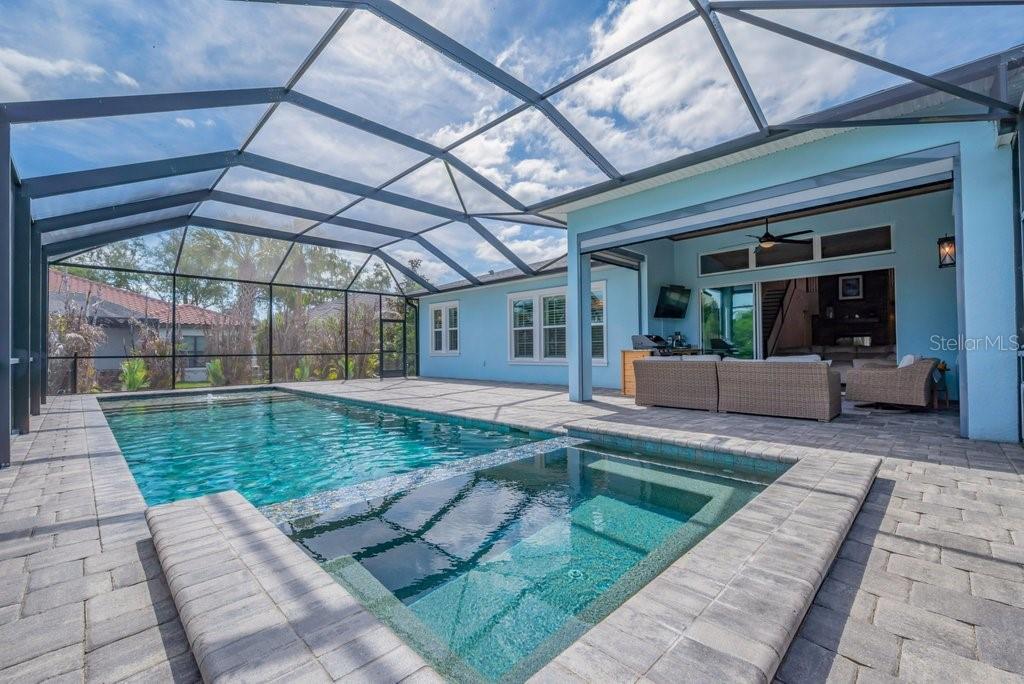 14908 Bassinger Lane Lithia, FL 33547 - Photo 39 of 56 a view of a backyard with furniture and porch area