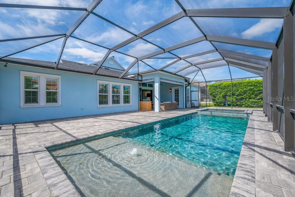 14908 Bassinger Lane Lithia, FL 33547 - Photo 41 of 56 a view of a house with backyard porch and sitting area