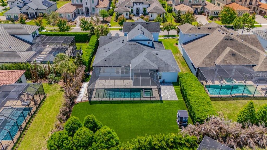 14908 Bassinger Lane Lithia, FL 33547 - Photo 51 of 56 an aerial view of a house with a garden and swimming pool