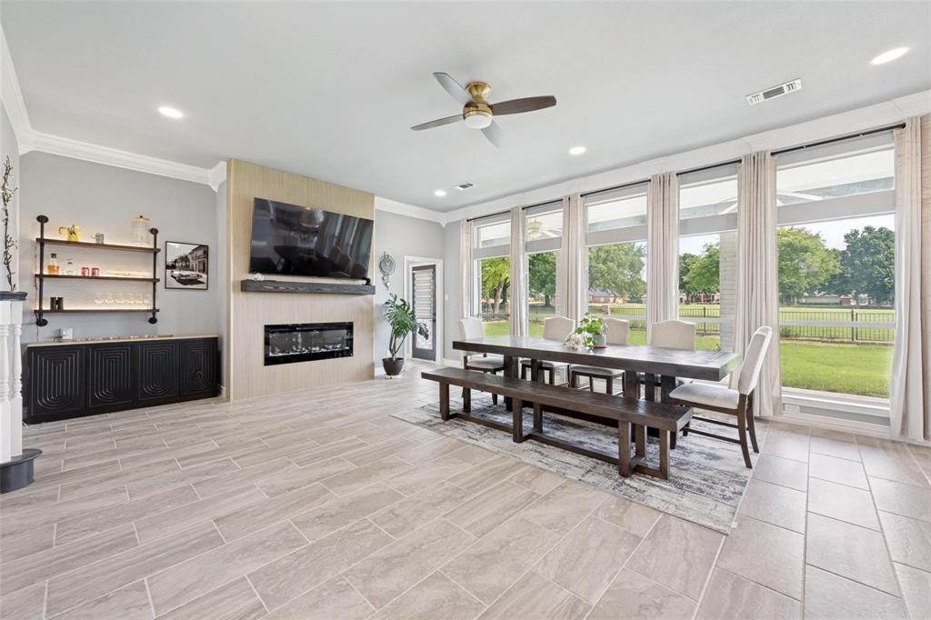 818 Riviera Drive Mansfield, TX 76063 - Photo 20 of 24 Spacious living area featuring light-toned tile flooring throughout