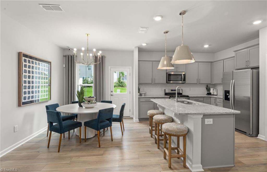 939 Poets Walk Road Whitsett, NC 27377 - Photo 4 of 17 Model Representation. Selections will vary.