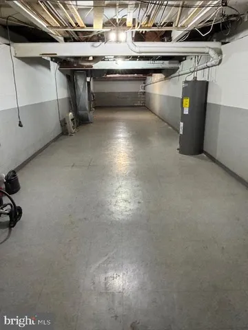 a room with water heater and storage