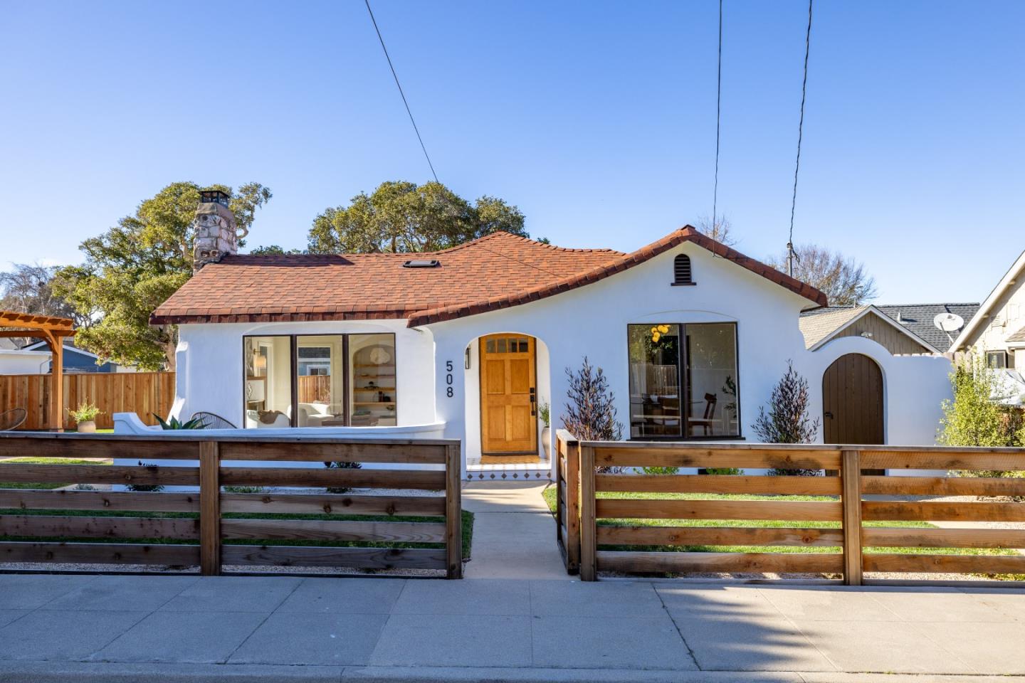 508 4th Street Pacific Grove, CA 93950 - Photo 1 of 20 a front view of a house with a yard