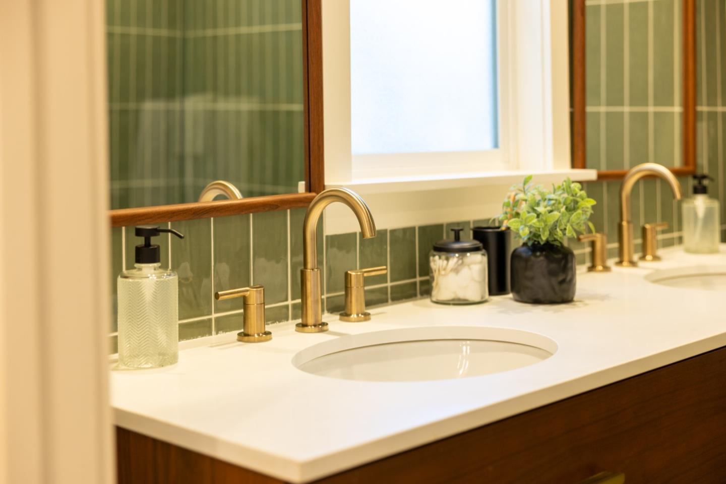 508 4th Street Pacific Grove, CA 93950 - Photo 16 of 20 a bathroom with a sink and a mirror