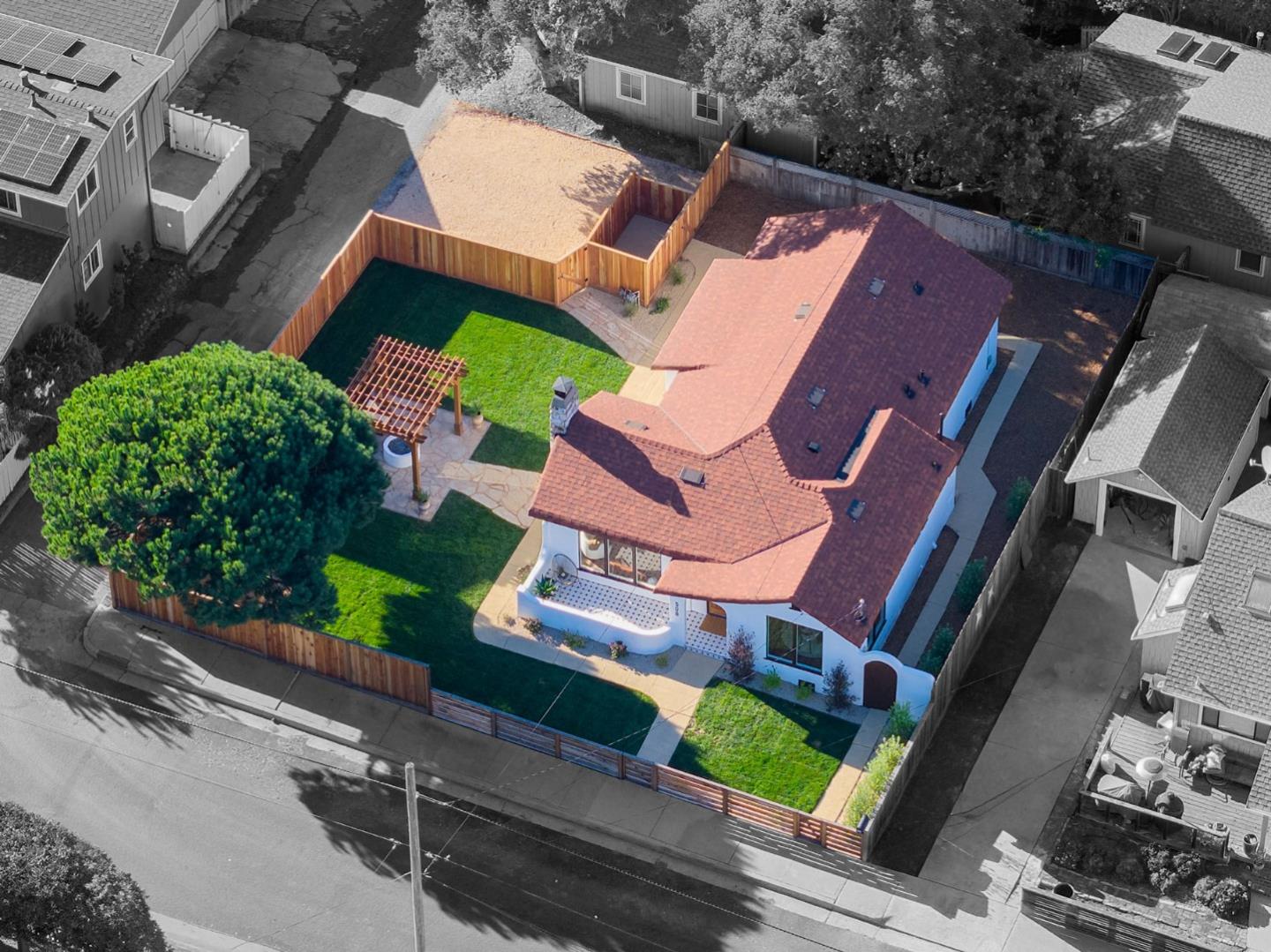 508 4th Street Pacific Grove, CA 93950 - Photo 19 of 20 an aerial view of a house with garden space and street view