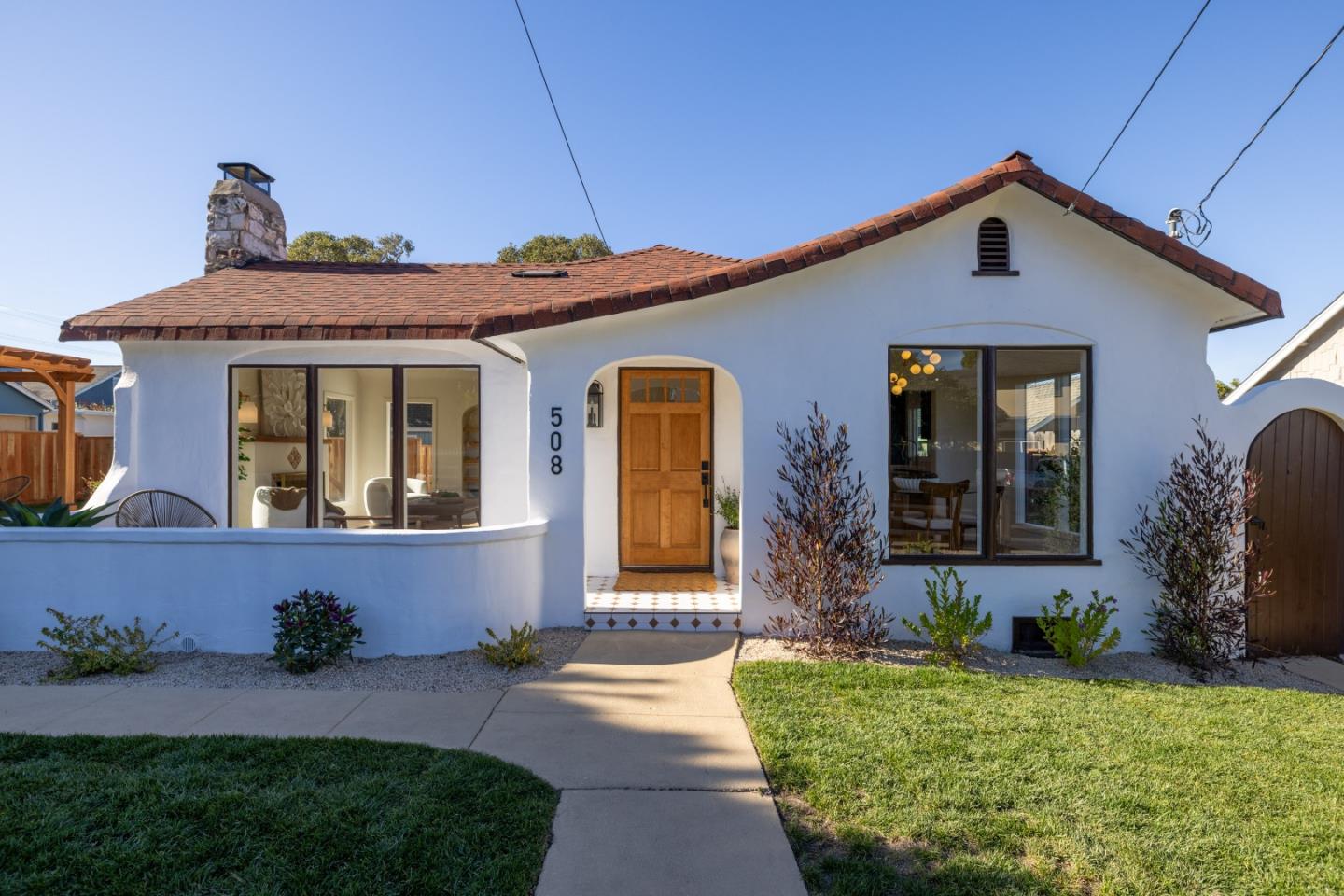 508 4th Street Pacific Grove, CA 93950 - Photo 2 of 20 a front view of a house with garden