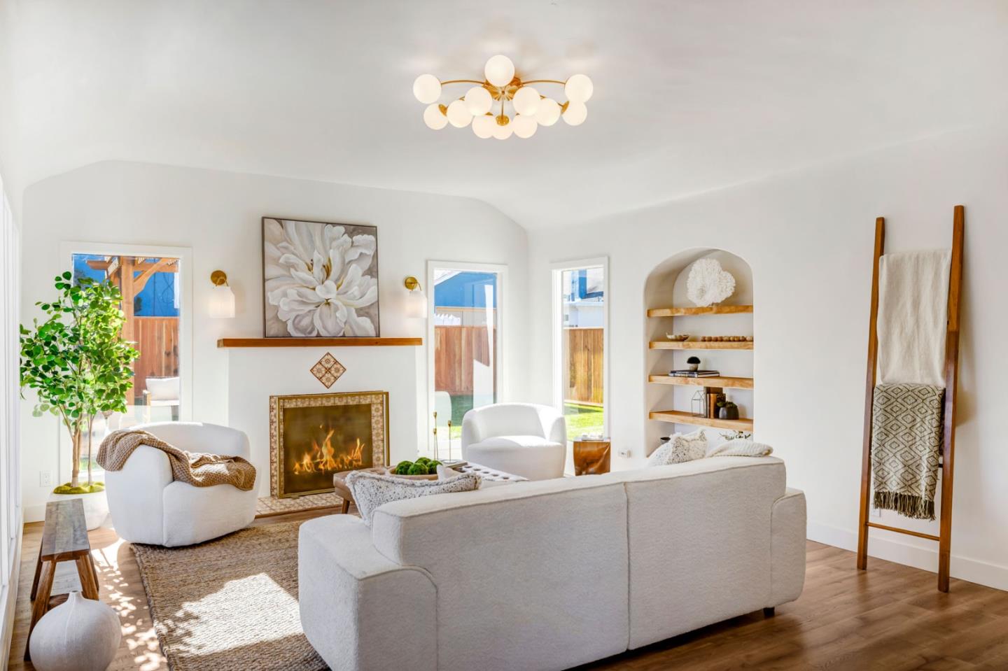 508 4th Street Pacific Grove, CA 93950 - Photo 3 of 20 a living room with furniture and a fireplace