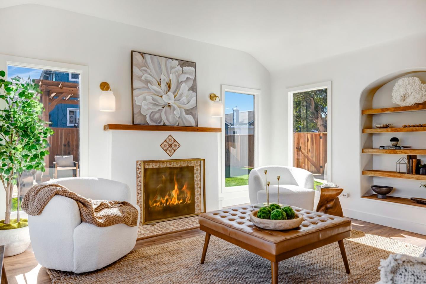 508 4th Street Pacific Grove, CA 93950 - Photo 4 of 20 a living room with furniture and a fireplace