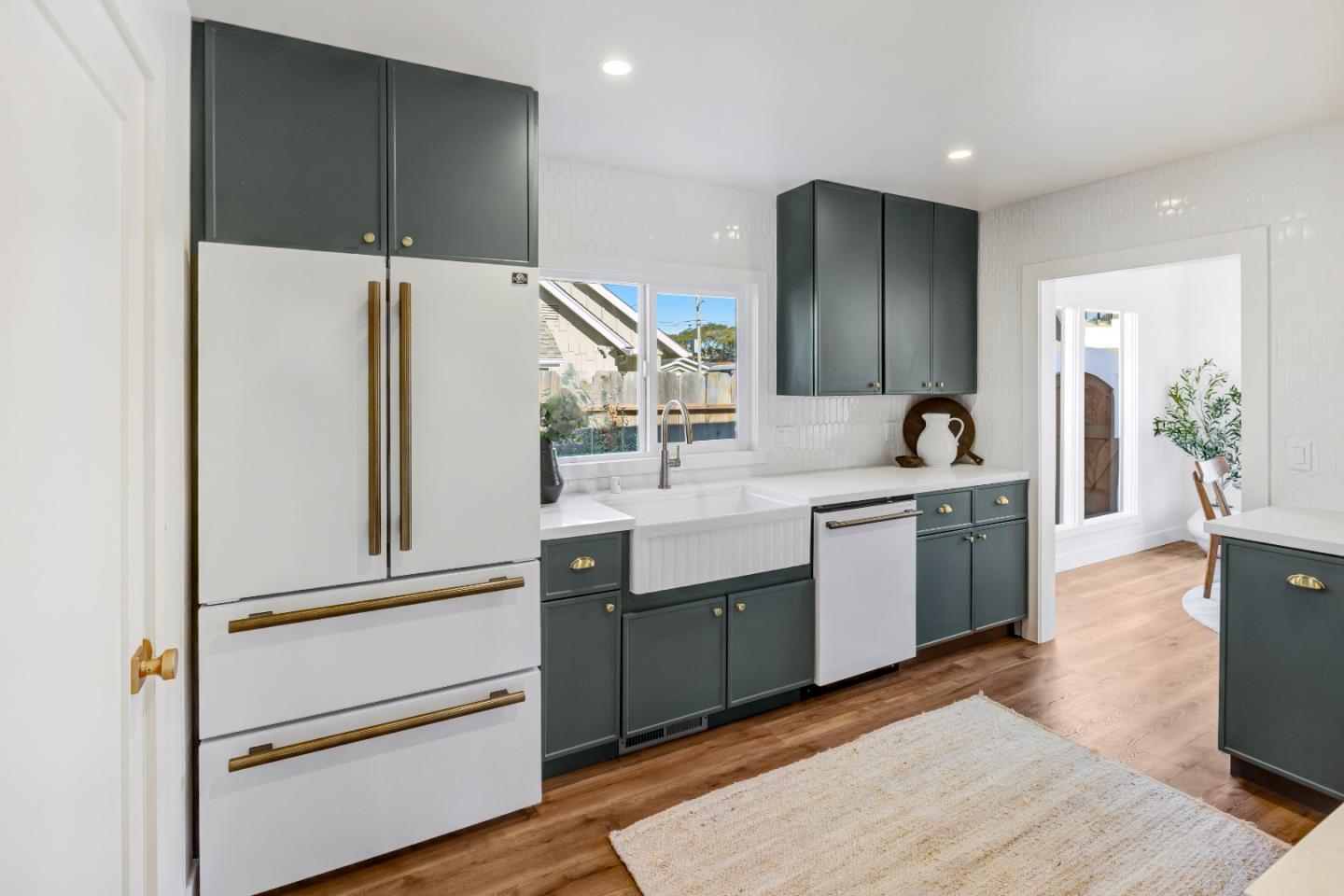 508 4th Street Pacific Grove, CA 93950 - Photo 9 of 20 a bathroom with a double vanity sink and a mirror