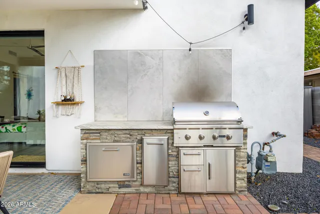 a white stove top oven sitting inside of a kitchen