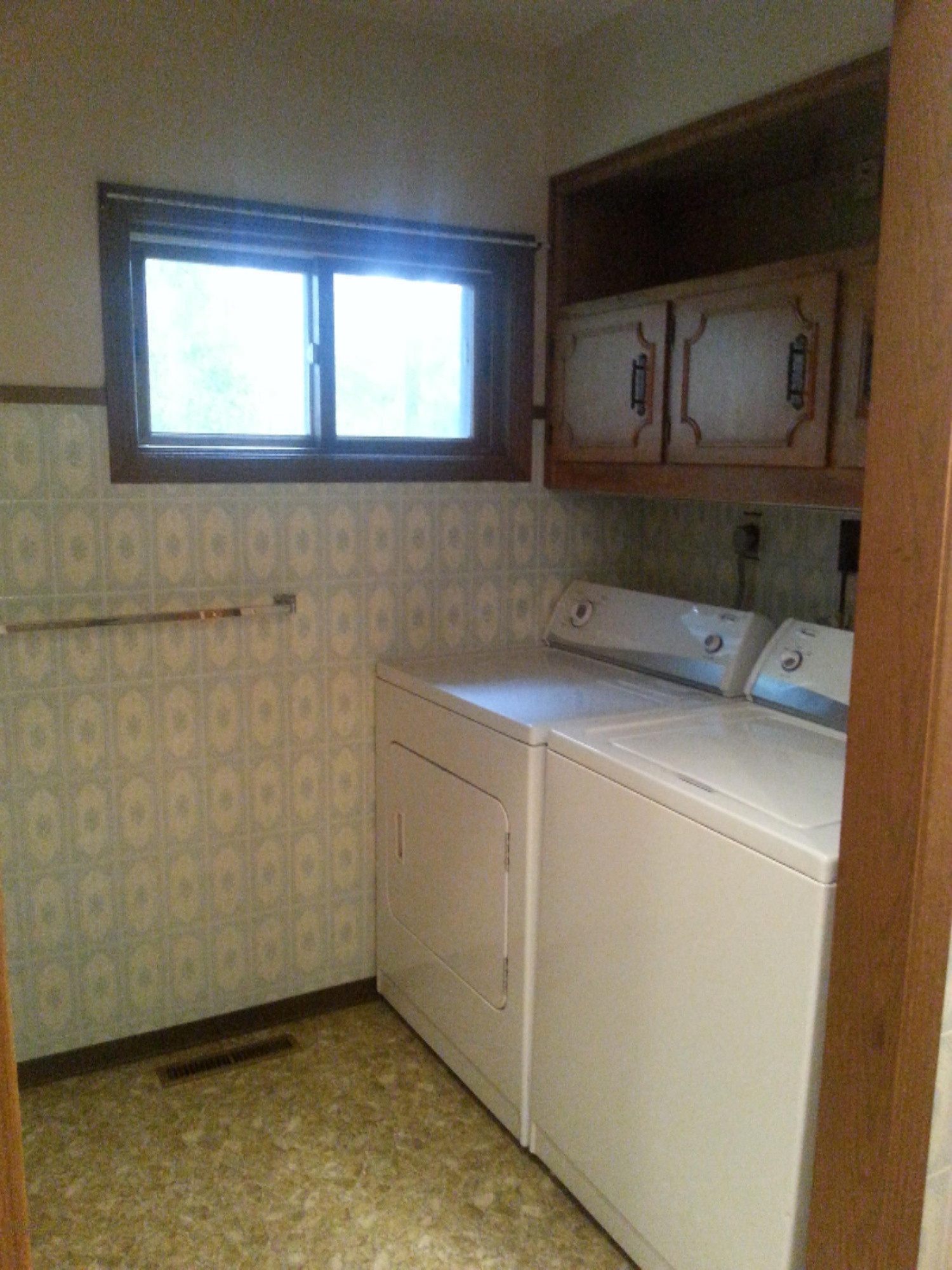 4665 Quarterline Road Muskegon, MI 49444 - Photo 8 of 18 Main floor Laundry Quarterline