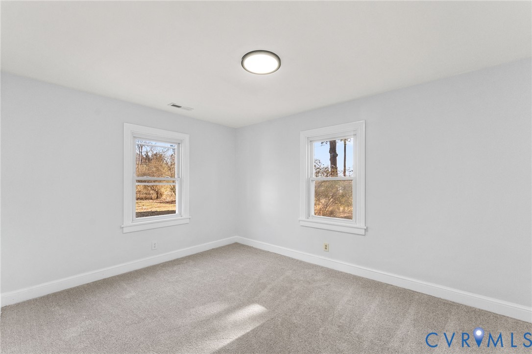 352 3rd Street Emporia, VA 23847 - Photo 12 of 25 an empty room with windows