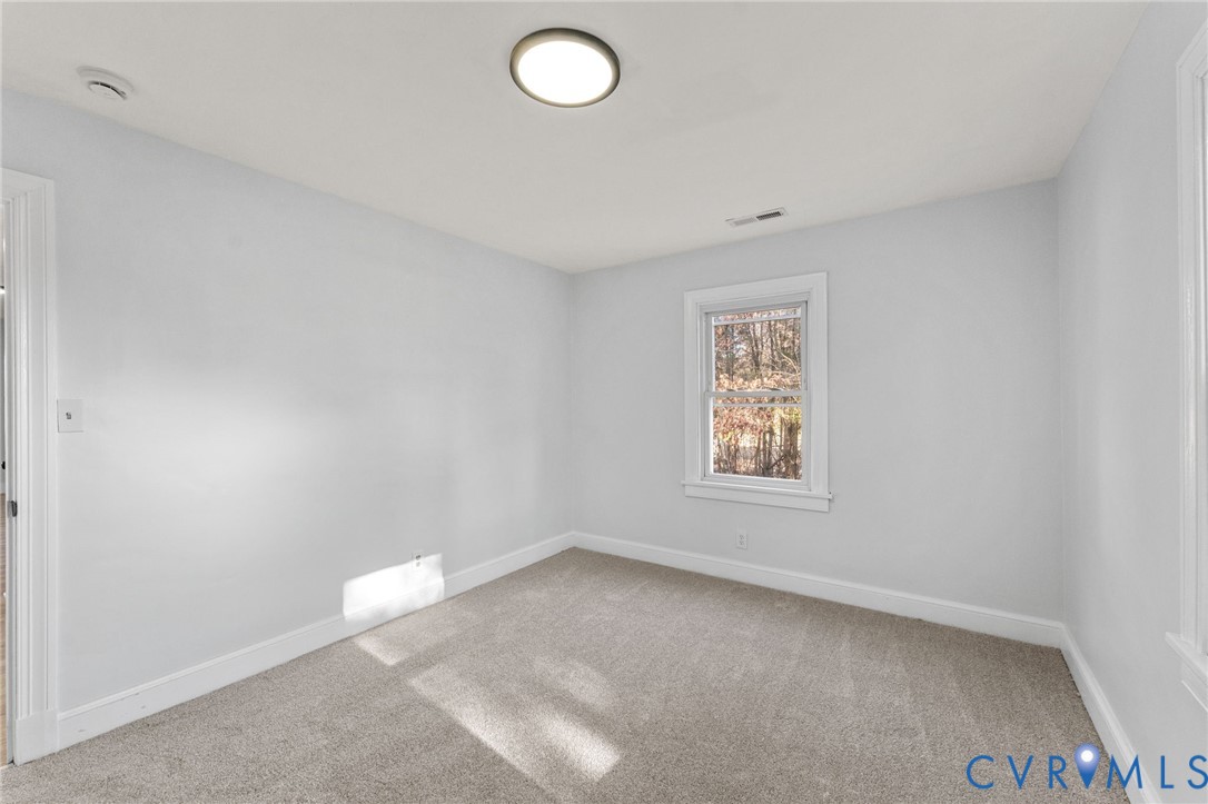 352 3rd Street Emporia, VA 23847 - Photo 13 of 25 an empty room with a window