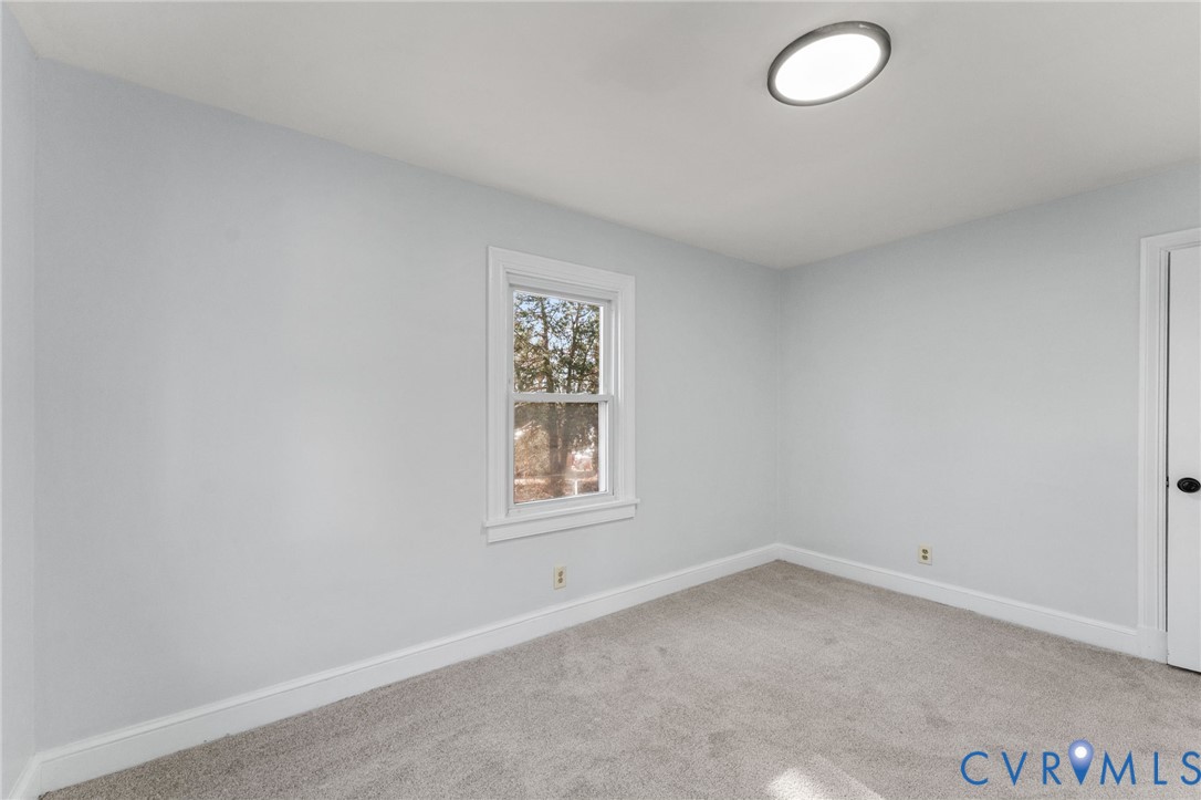 352 3rd Street Emporia, VA 23847 - Photo 14 of 25 an empty room with a window