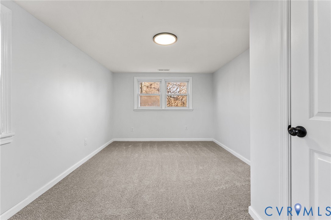 352 3rd Street Emporia, VA 23847 - Photo 18 of 25 an empty room with a window