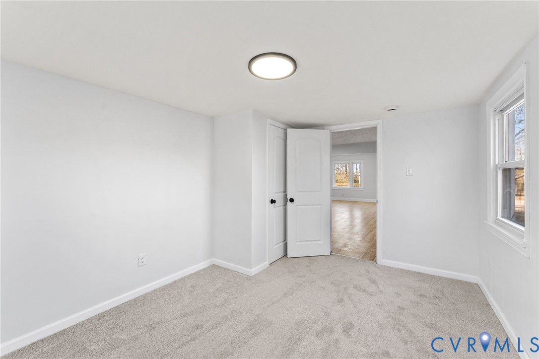 352 3rd Street Emporia, VA 23847 - Photo 19 of 25 an empty room with windows and closet