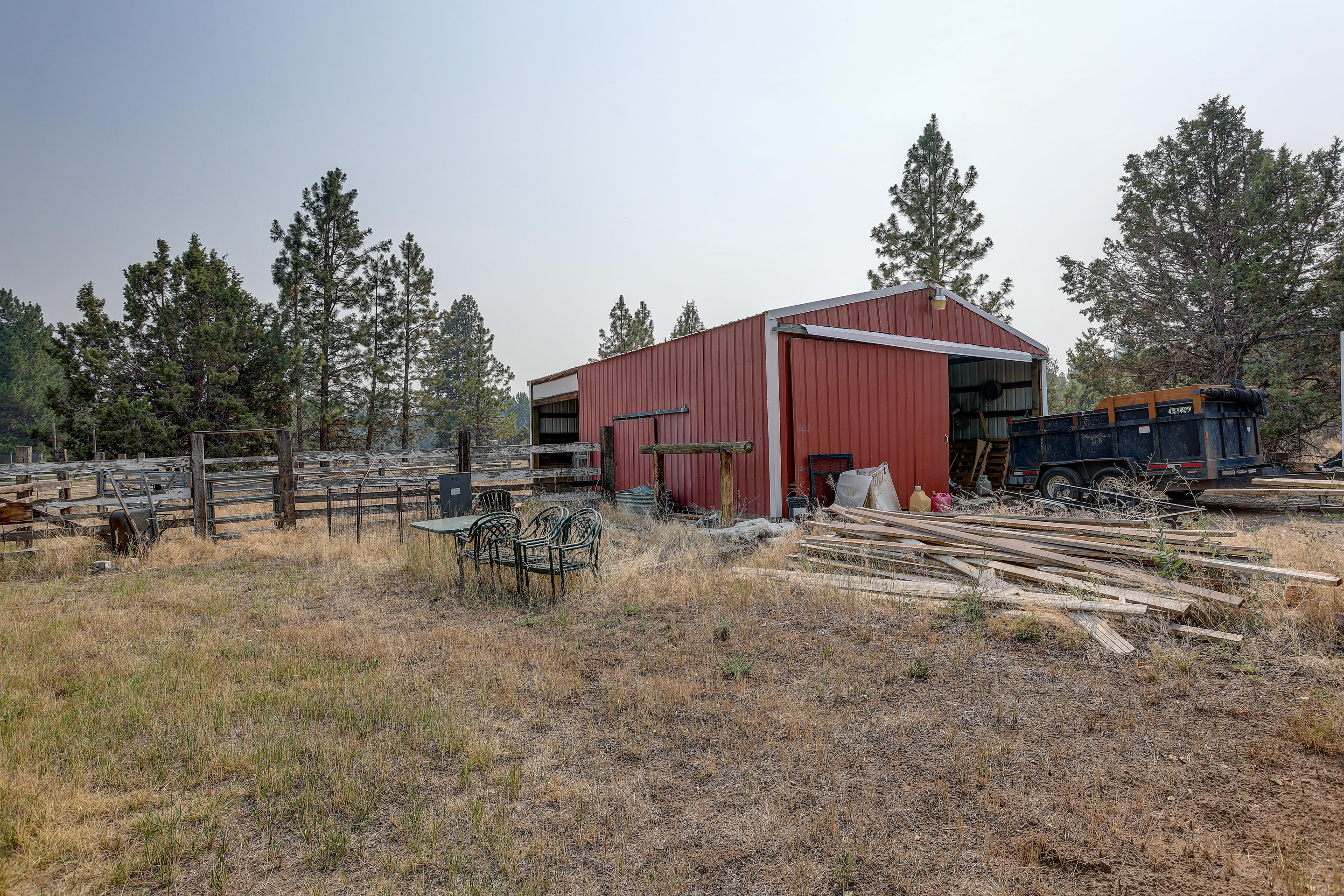 60875 Billadeau Road Bend, OR 97702 - Photo 35 of 42 a view of a house with a yard
