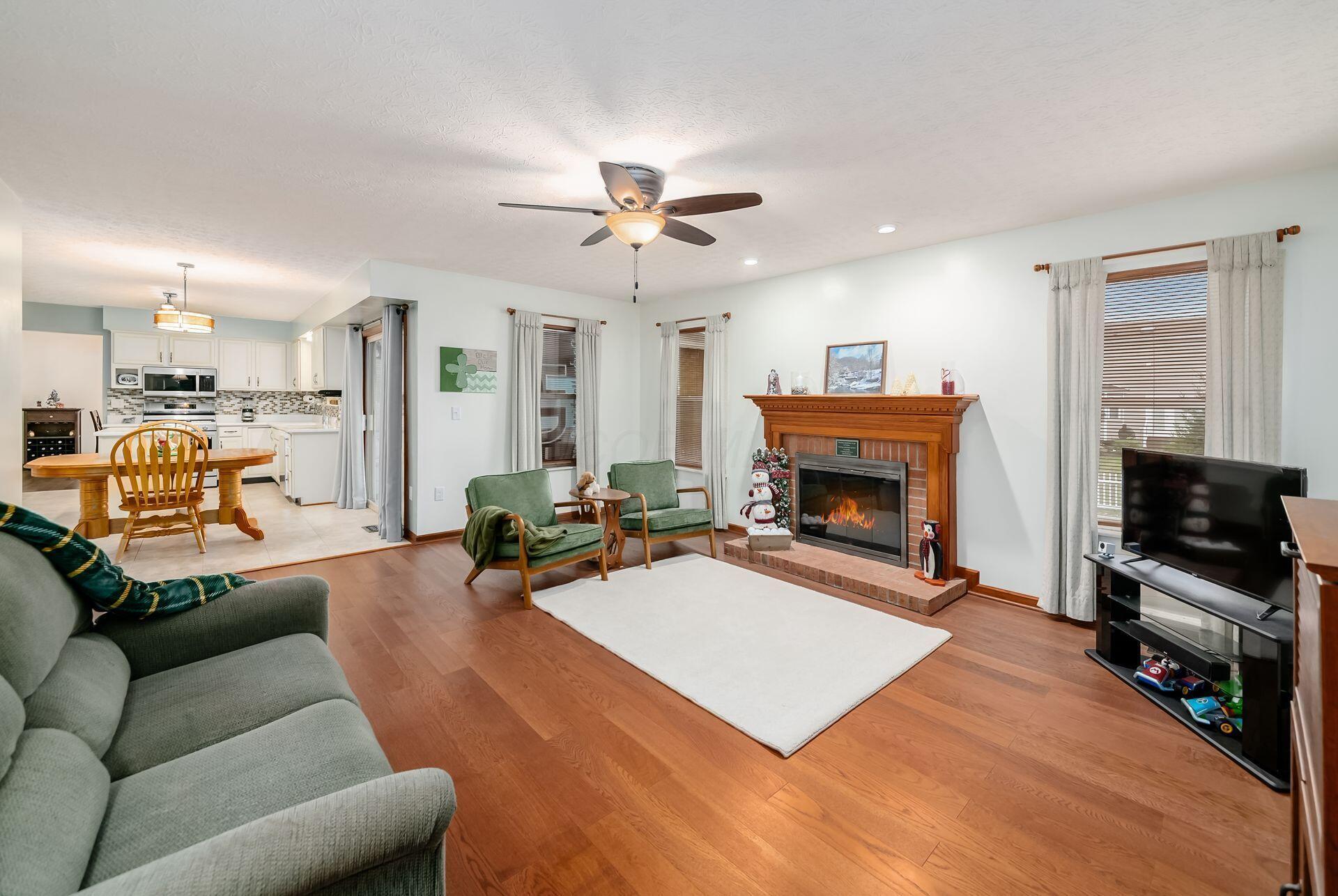 5581 Seapine Road Hilliard, OH 43026 - Photo 21 of 58 Family Room - 18'8" x 15'3" - Woodburning Fireplace with Gas Logs, Glass Door