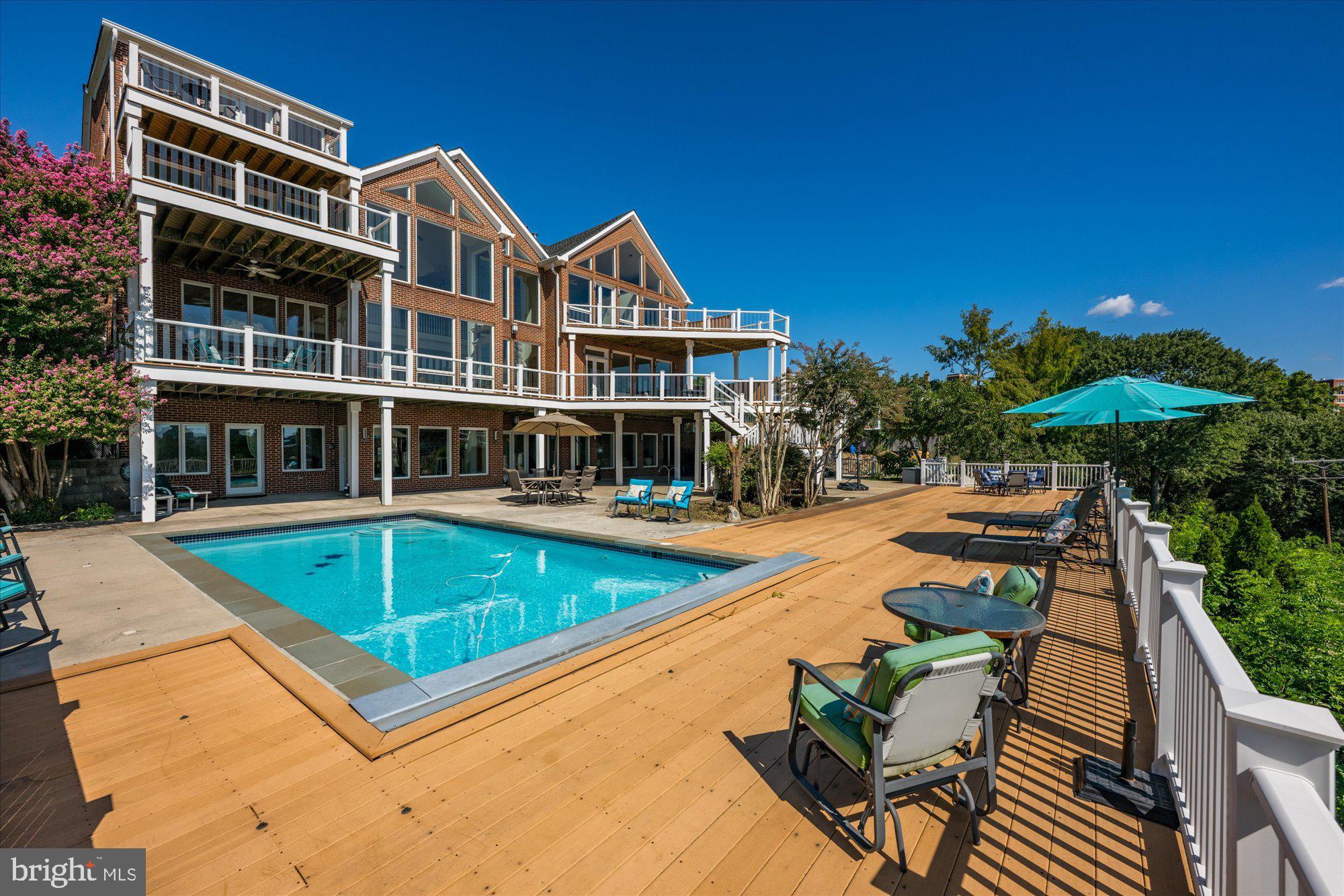 1701 South Arlington Ridge Road Arlington, VA 22202 - Photo 82 of 90 Pool Deck and seating area