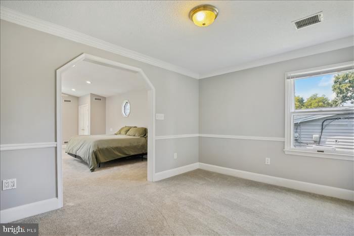 8104 Russell Road Alexandria, VA 22309 - Photo 14 of 51 Primary Bedroom with large sitting area