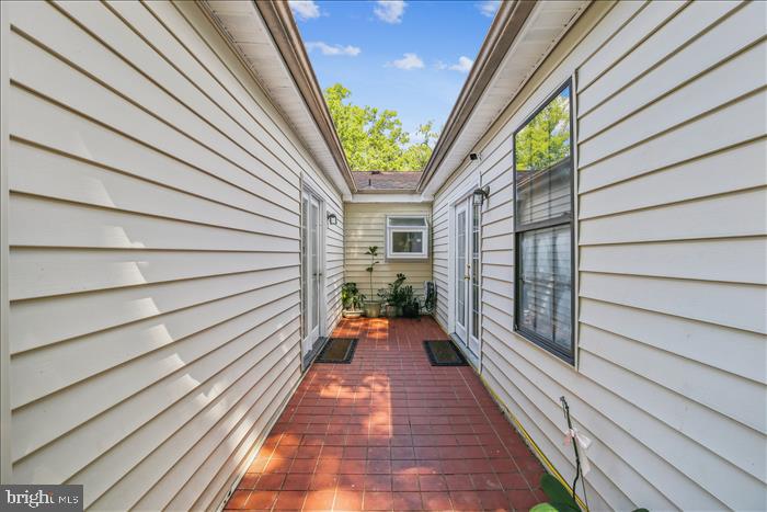 8104 Russell Road Alexandria, VA 22309 - Photo 45 of 51 Allows for Primary bedroom and Great Room entry