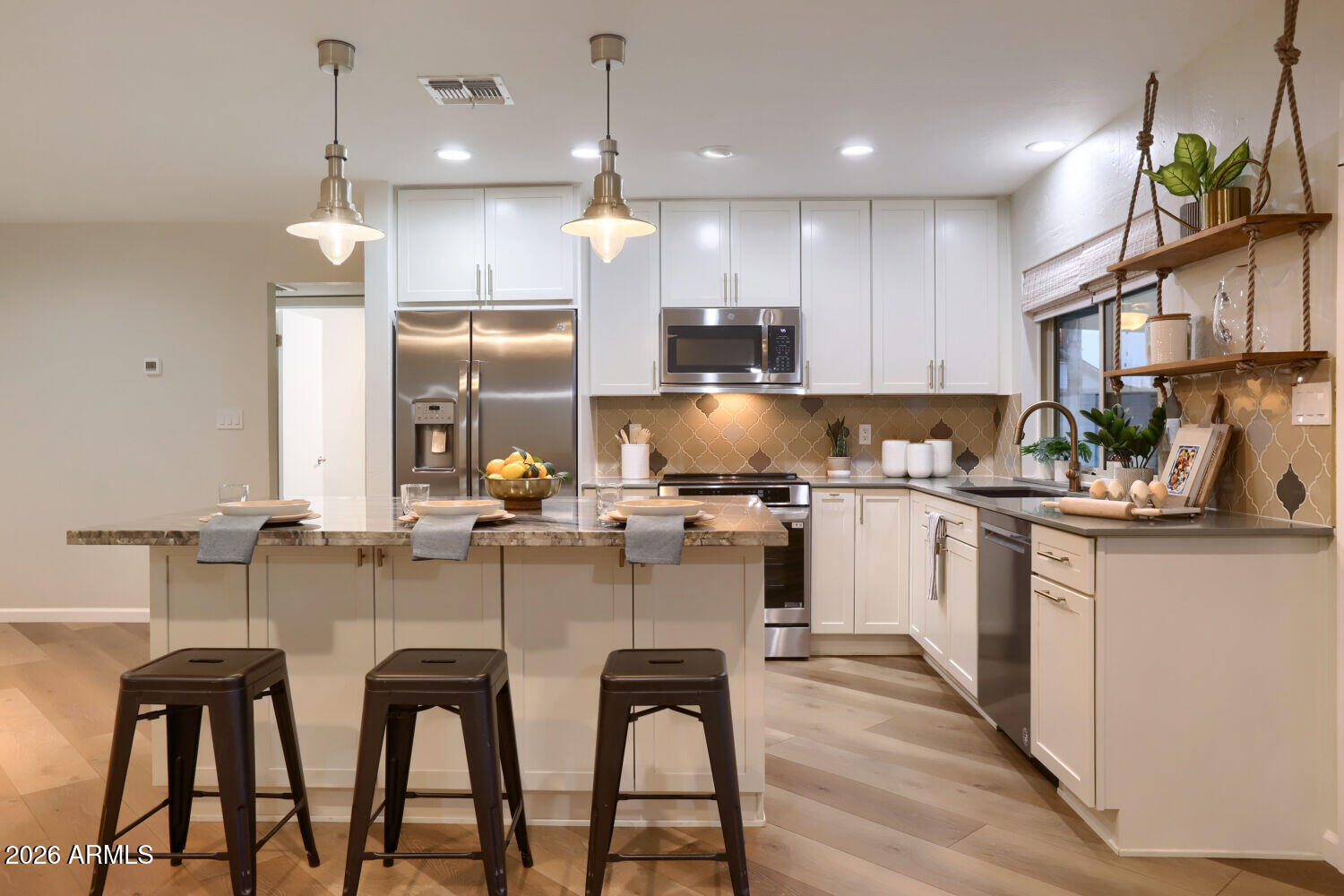 3641 West Grandview Road Phoenix, AZ 85053 - Photo 7 of 22 Kitchen Island with extra lighting