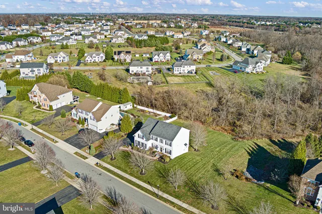 a living room with furniture fireplace and flat screen tv