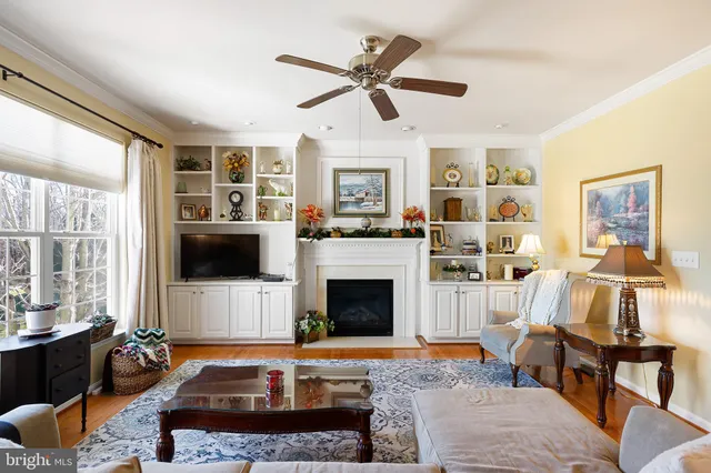 a kitchen with kitchen island a large counter top space appliances and cabinets